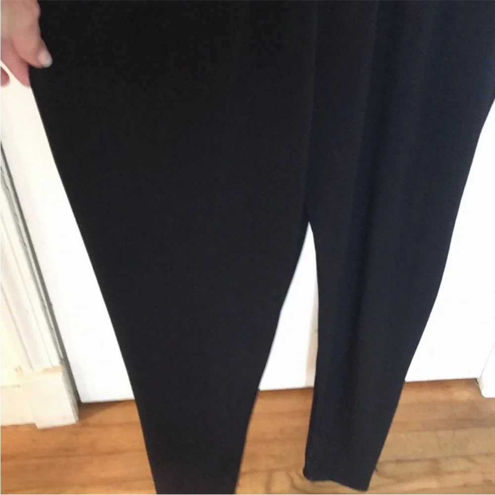 Micheal Kors size medium black long sleeve jumpsuit rhinestone embellished